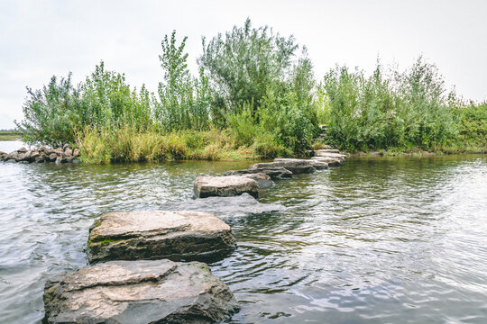 Stepping Stones In Water Over Maas River Den Bosch Brabant Holland Netherlands