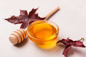 Honey or maple syrup in a bowl.

