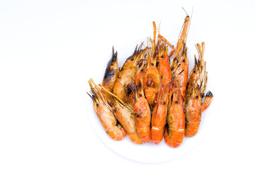 Delicious river prawns burnt on a white background