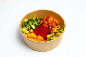 Poke bowl with raw salmon, rice and vegetables on white background