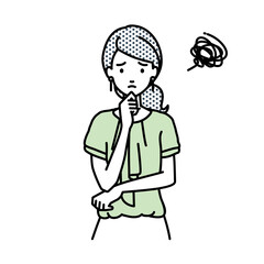 立って手をあごにあてて困っているオフィスカジュアルの女性