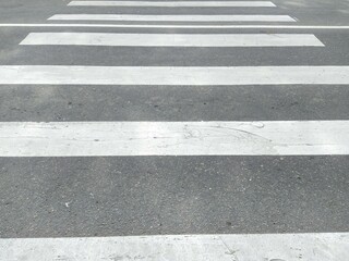 old and shabby pedestrian crossing in the daytime.