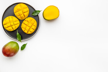 Breakfast with mango fruits. Tropical fruits background. Top view