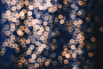 Gold glare on dark blue background