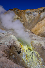 The photo shows a place with boiling sulfur and toxic fumes. This is the fumarole valley of the Mutnovsky volcano. Kamchatka Peninsula