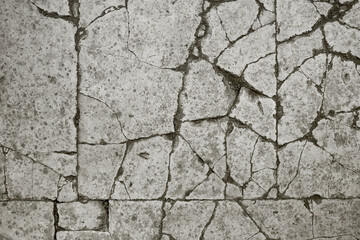 Old aged damaged marble bumpy uneven blocks. Trip pitted grunge granite tile cobble. Cragged grimy retro cranny frayed run track. Crannied dirtied shabby smashed gaping rustic big holes for 3d design