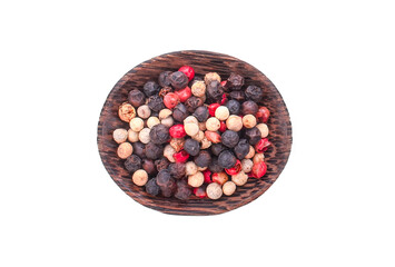 Mixed Red, Black and White Peppercorn in Wooden bowl on white background.