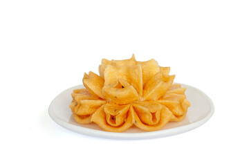 Crispy Lotus Blossom Cookie is Thai dessert (Khanom Dok Jok) in plate isolated on white background included clipping path.