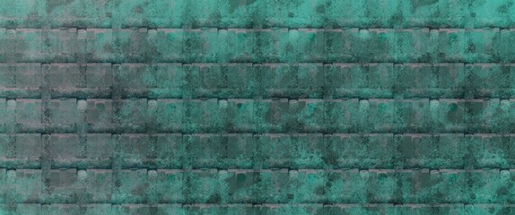 Green texture of a wall with dirty smudges, abstract art, material grunge made from simple bricks