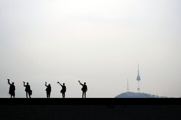 Fototapeta na wymiar Dynamic silhouette Seoul N Tower landmark