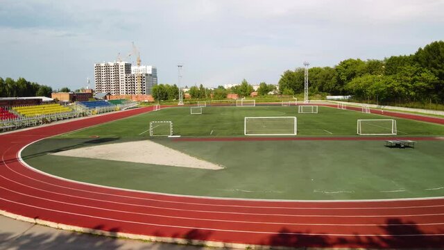 A new stadium in the area of new urban buildings. Modern sports facilities in Russia.