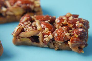 Almond and oat protein bars on table .