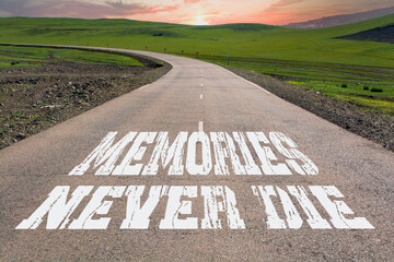 Memories Never Die written on rural road