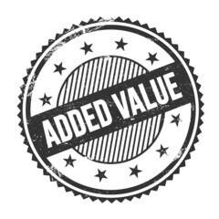 ADDED VALUE text written on black grungy round stamp.