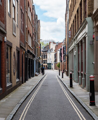 City of London side street. A narrow side road with a contrast of old and new architecture in EC1. - 454541632