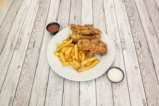 Crispy Kentucky Chicken Plate with French Fries and Dipping Sauces