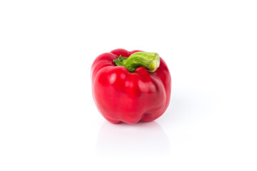 Raw bell pepper on the white glossy background