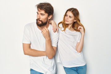 cheerful young couple communication friendship casual clothes light background