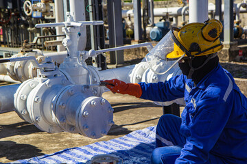 Male worker painted pipes