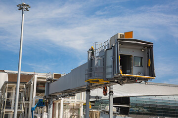 Passengers are connected to planes in the airport
