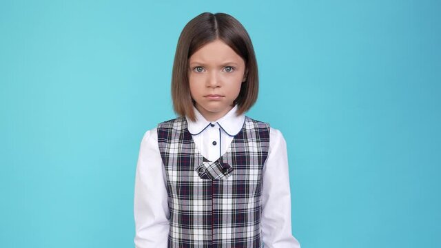 Speechless stunned troubled frightened schoolgirl palms cover mouth