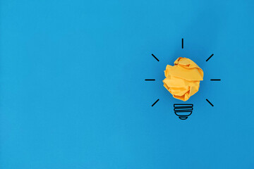 Creative idea light bulb concept with copy space on blue background