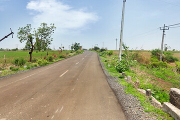 Fototapeta na wymiar road in the countryside rural area Gujarat India
