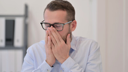 Portrait of Middle Aged Man Sneezing 