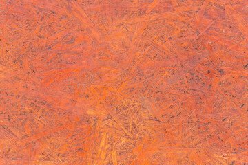 Red chipboard brown particleboard pattern pressed wood material surface texture background