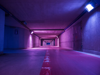 Neon tunnel at night, blue and pink lights