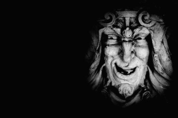 Monster face of Greek antique god daimon of eager rivalry, envy, jealousy, and zeal Zelus (Zelos)....
