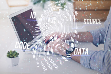 Fingerprint identification. Man working on laptop at table in office, closeup