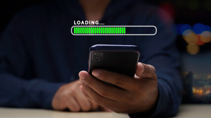 Close up man using mobile smartphone for download application and waiting to loading. loading bar symbol. businessman downloading digital business data form website and cloud to smartphone.
