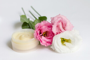 Fototapeta na wymiar Cream in a jar on a white background