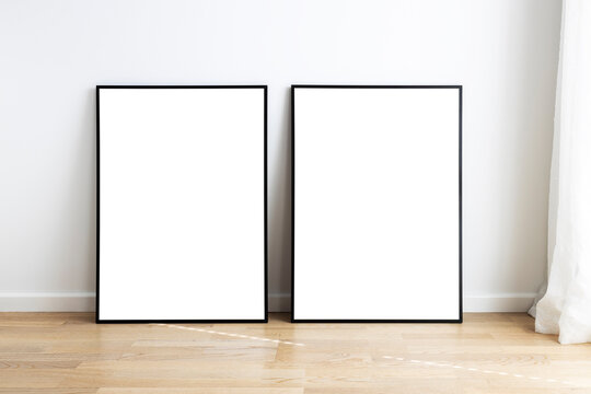 Modern neutral room with frames