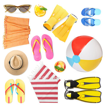 Set with towels and other beach accessories on white background