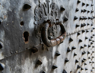 knocking in your door, antique door knock in metal with some rust 