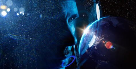 Fototapeta na wymiar Planet Earth from space at night. Elements of this image furnished by NASA. Double exposure portrait of astronaut in spacesuit. Astronomy conception. Distant galaxies and deep space.