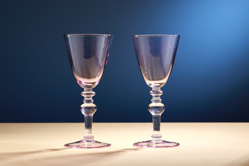 champagne glass clear isolated on blue background