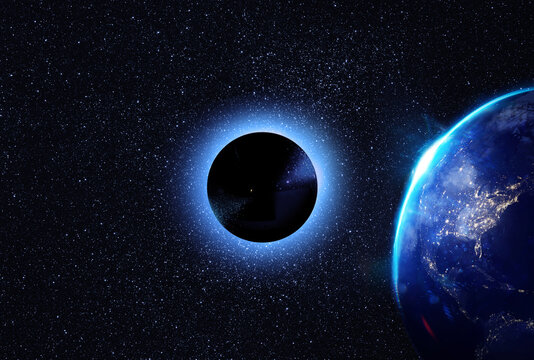 Eclipse of the moon. Planet Earth from space at night. Elements of this image furnished by NASA. Astronomy conception. Distant galaxies and deep space.