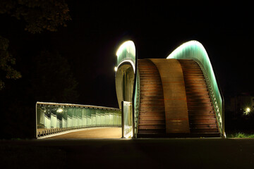 Poland, Lublin, The bridge at the Ludowy Park at night.
 - obrazy, fototapety, plakaty