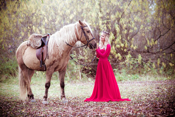 Princess with horse in red dress with horse