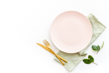 Table setting overhead view - plate with cutlery set and napkin