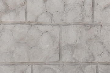 Weathered brick old gray broken wall with cracks texture damaged stone background