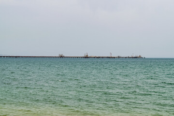 View of an oil pipeline and a dock for oil tankers.