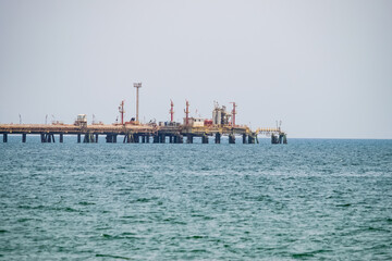 View of an oil pipeline and a dock for oil tankers.