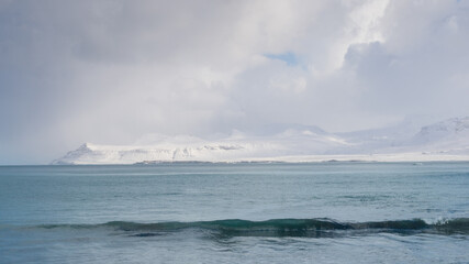 Small wave in Ólafsvik bay on Snaefellsnes peninsula, Iceland.