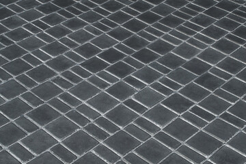 Surface urban dark floor texture paving stone mosaic tiles black road slabs background