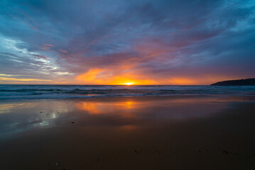 Obraz na płótnie Canvas Sunset over the sea. Nature and travel concept