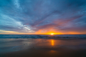 Fototapeta na wymiar Sunset over the sea. Nature and travel concept